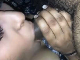 Adorable Indian woman performs a sensual blowjob in a video clip