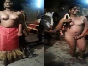 Tamil girl's nude dance in a village setting