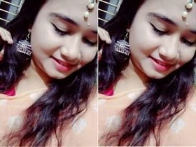 Exclusive video of a Desi girl revealing her breasts and pussy