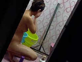 Desi girl takes a bath and washes her panties in secret