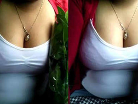 Busty beauty teases on the bus with cleavage-focused video