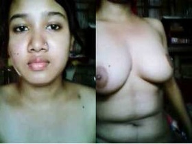 Exclusive video of a sexy Indian girl showing off her boobs and masturbating