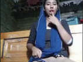 Desi girl enjoys fingering and wearing a condom