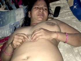 Fatty aunty gives her husband a blowjob in this Indian porn video