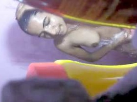 Sorna's secret recording of her bath time in a village bathroom