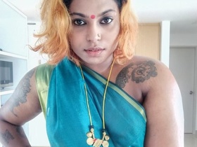 Indian bhabhi in tank top cooks and bares her breasts