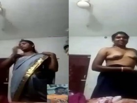 Tamil housewife in saree gets naughty in hot video