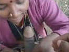 Indian wife Minette gives a blowjob in the village