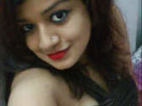 Cute girlfriend shows off her big boobies in a nude video