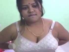Indian beauty flaunts her big boobs and fat ass in solo video