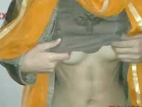 Indian teen shows off her tits and pussy in a village