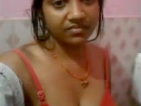 Desi prostitute flaunts her breasts and vulva