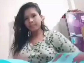 Young girl with a perfect body demonstrating oral sex techniques