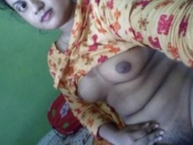 Cute girl records a video of herself fingering for her lover