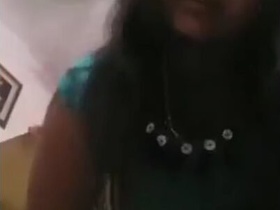 Indian girl with large breasts flaunts her assets