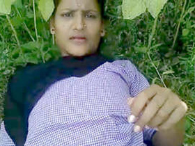 Desi rural woman from a village engages in outdoor sexual activity