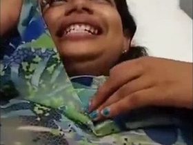 Watch a Tamil wife get horny and finger herself in this cute video