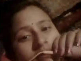 Desi wife and husband chat in a village setting