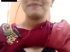 Cute girl with nice boobs and shows her pussy in a sexy video