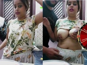 A hot Indian wife gives a blowjob on camera while displaying her big breasts