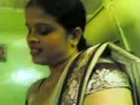 Indian masseuse gives sensual massage to customer in parlour