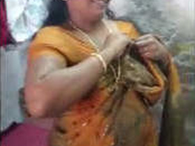 Aunty from the south strips down to lingerie