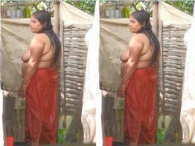 Indian auntie bathing on the street in part 2