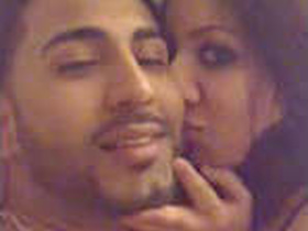 Young couple enjoys intimate moments in bed