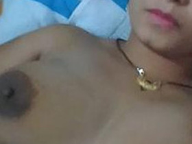 Desi Indian girl with natural boobs flaunts her assets in amateur porn video