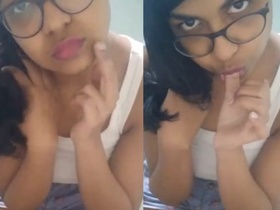 Cute Indian girl pleasures herself with fingers and tongue in selfie video