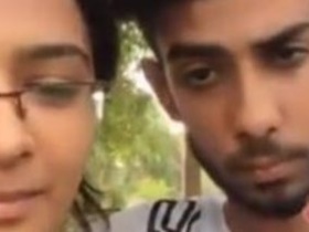 Smiling couple shares sweet kisses in intimate video