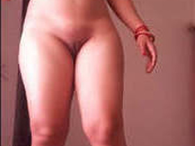 Desi girl shows off her naked body while standing tall