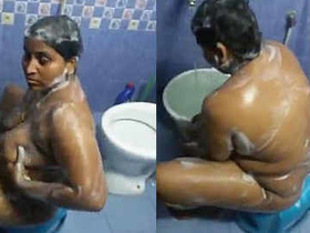 Tamil aunty takes a bath in her private pool