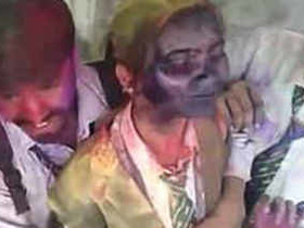 Classmate's Holi Celebration with Colorful Rubs in Video