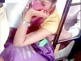 Desi girl's breasts squeezed tightly on the bus and she enjoys it