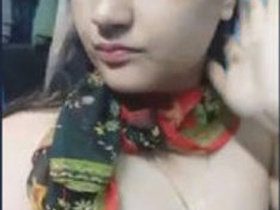 A charming Indian girl flaunts her perky breasts
