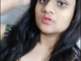 A cute Indian wife flaunts her hot body and reveals her perky breasts and tight pussy