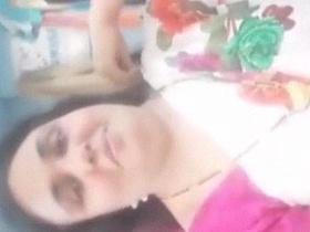 Indian auntie strips down and teases in solo video