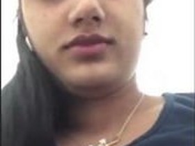 Cute desi wife flaunts her nice boobs in a show