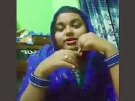 Odia girl teases with her boobs and masturbates to a song