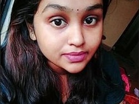 Tamil bhabhi's attractive face in a steamy video