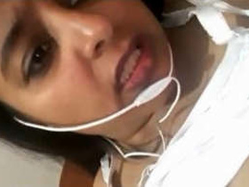 An attractive Indian woman masturbates during a video call