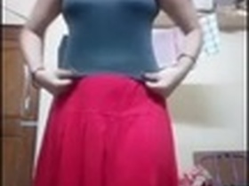 A young woman recording MMS of herself