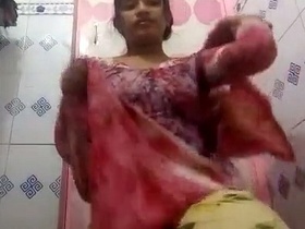 Indian girl strips naked and takes a nude selfie in the bathroom