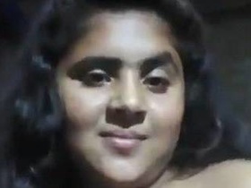 Desi slut flaunts her oily pussy and big boobs in solo video