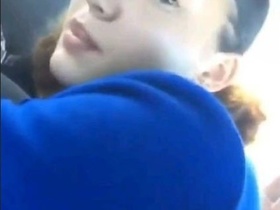 Horny babe rides her man in the car