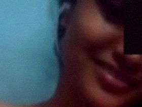 Nude Indian girl with big boobs takes solo nude video