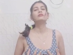 Indian wife in the bathroom, naked and sexy in a solo video